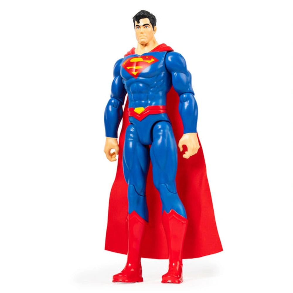 DC Comics Superman action figure stands confidently in blue and red, featuring a cape and a muscular build against a white ba
