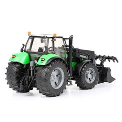 Green Bruder Deutz Agrotron X720 tractor toy with frontloader, large treaded tires, and detailed cabin on white background.