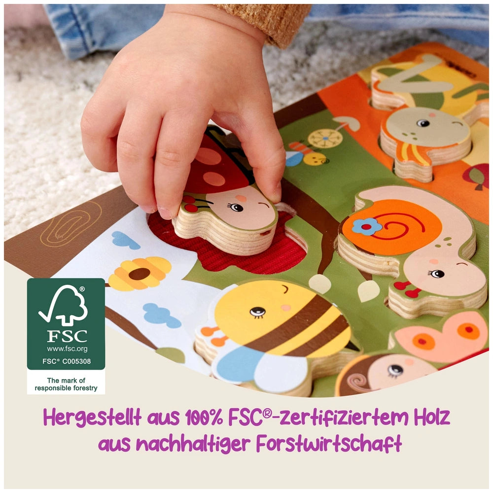 Eichhorn Bee-Happy Sensory Puzzle features colorful wooden animal pieces being played with by a child's hand on a soft mat.