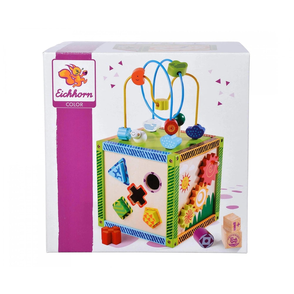 Eichhorn Color Little Play Center is a vibrant green and yellow baby activity toy featuring various shapes for building and c