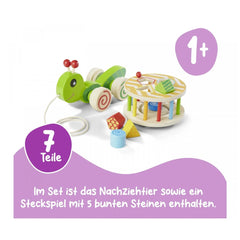 Colorful pull-along stacking animal toy set featuring a green frog, wooden car with red wheels, and a striped play mat.
