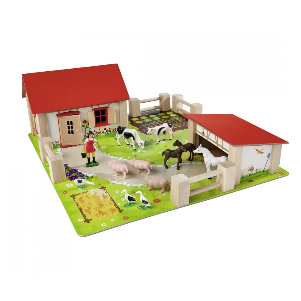 Eichhorn Little Farm Set features a colorful wooden barn, animals, fence, and green baseplate for imaginative play.