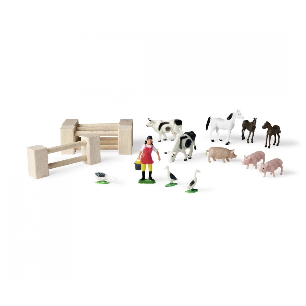 Eichhorn - Little Farm Set features wooden animals and a simple fence, depicting a charming rural farm scene.