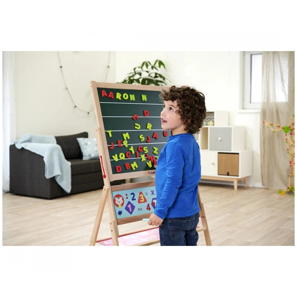 Eichhorn Magnetic Drawing Board in a child-friendly room, promoting learning with letters and numbers for educational play.