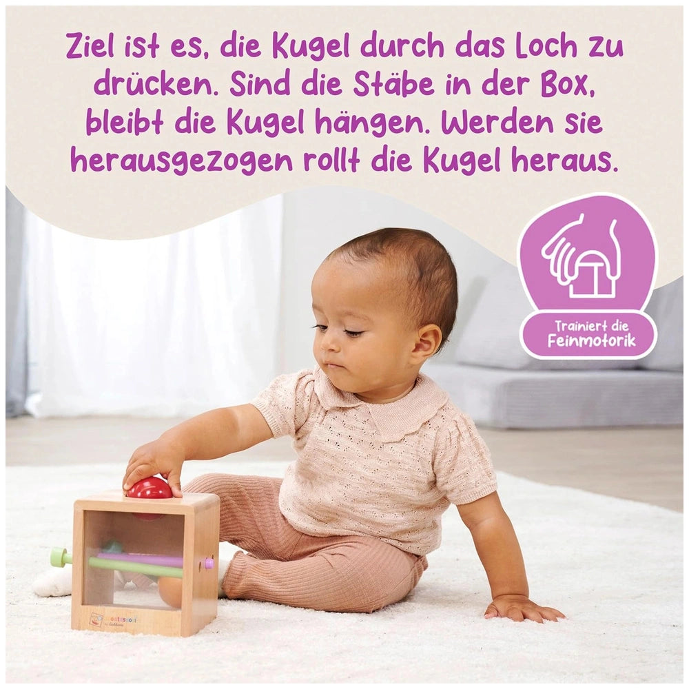 Eichhorn Montessori Interactive Educational Toy set, featuring a baby engaging with a colorful wooden toy on a white carpet.