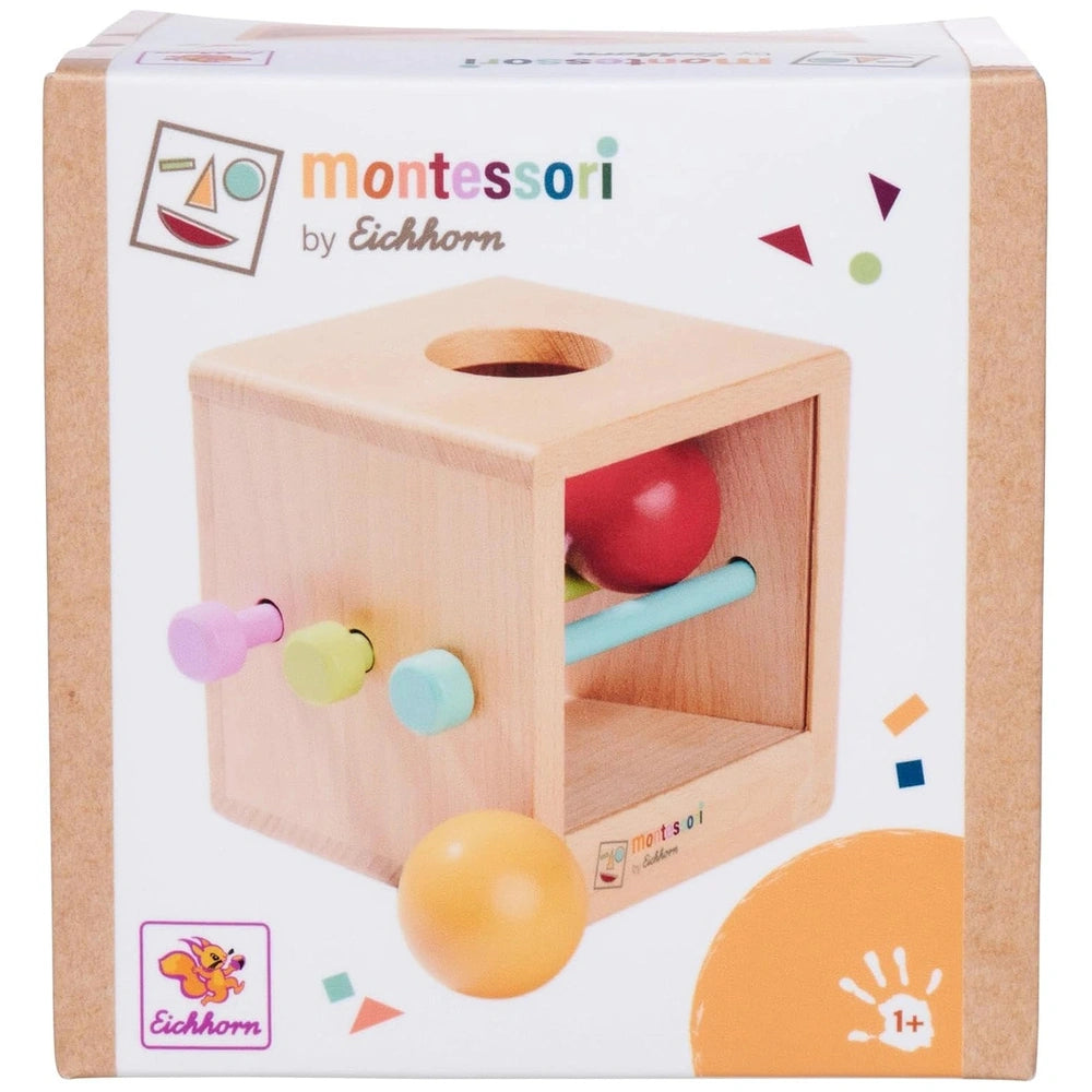 Eichhorn Montessori interactive educational toy with wooden cube, colored balls, and packaging showcasing vibrant design.