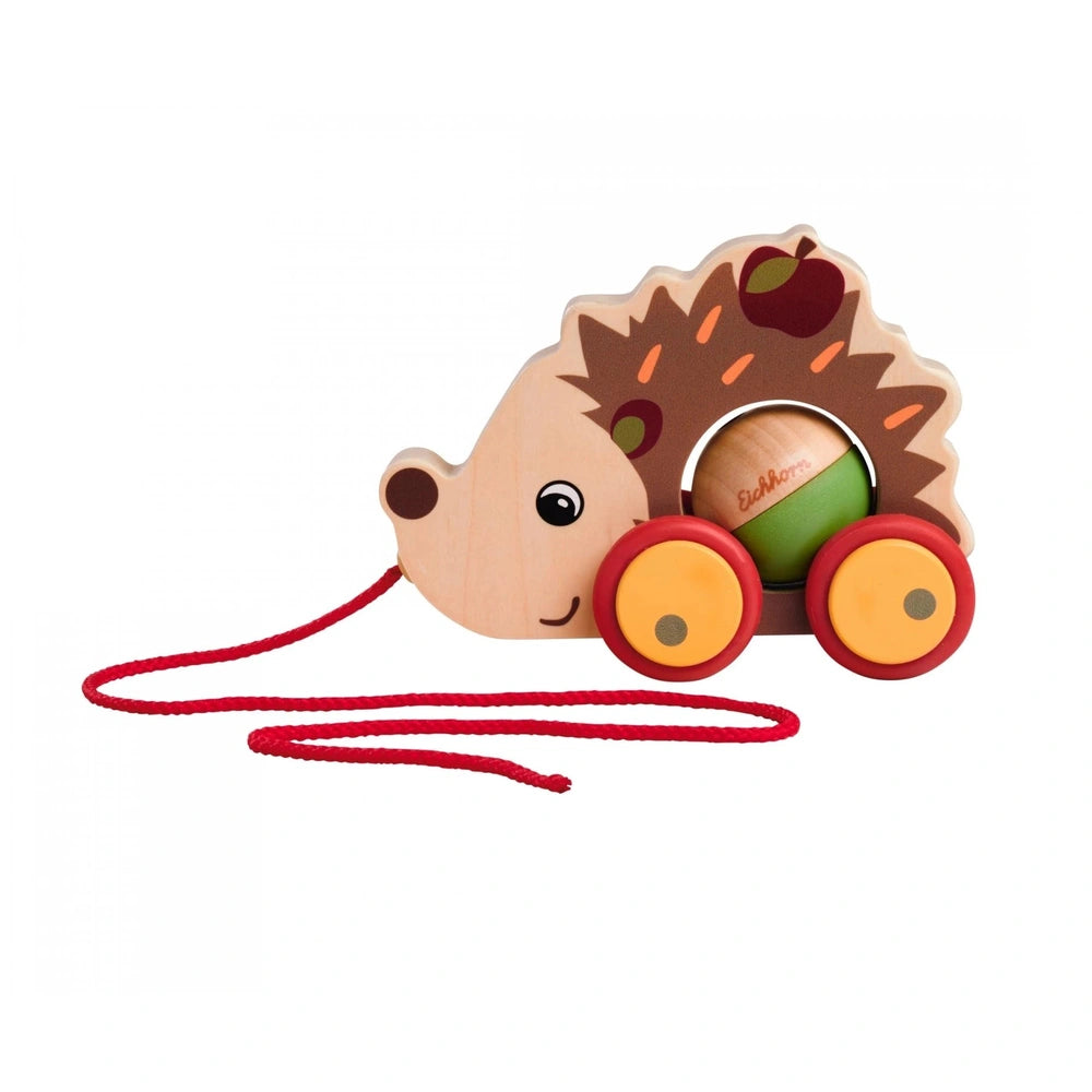 Eichhorn pull back hedgehog toy, wooden with bright colors, red wheels, and a playful design for young children.