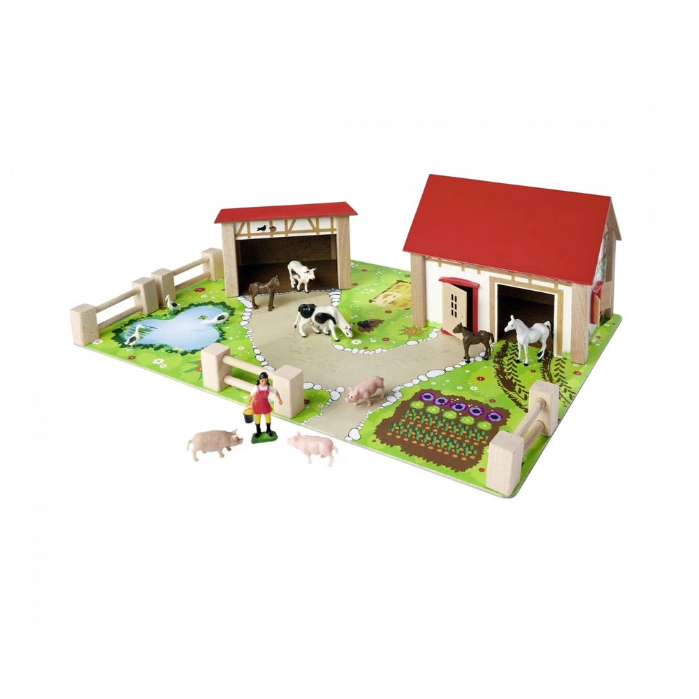 Eichhorn Wooden Farm Playset features a red barn, animals, and accessories in a vibrant miniature farm scene.
