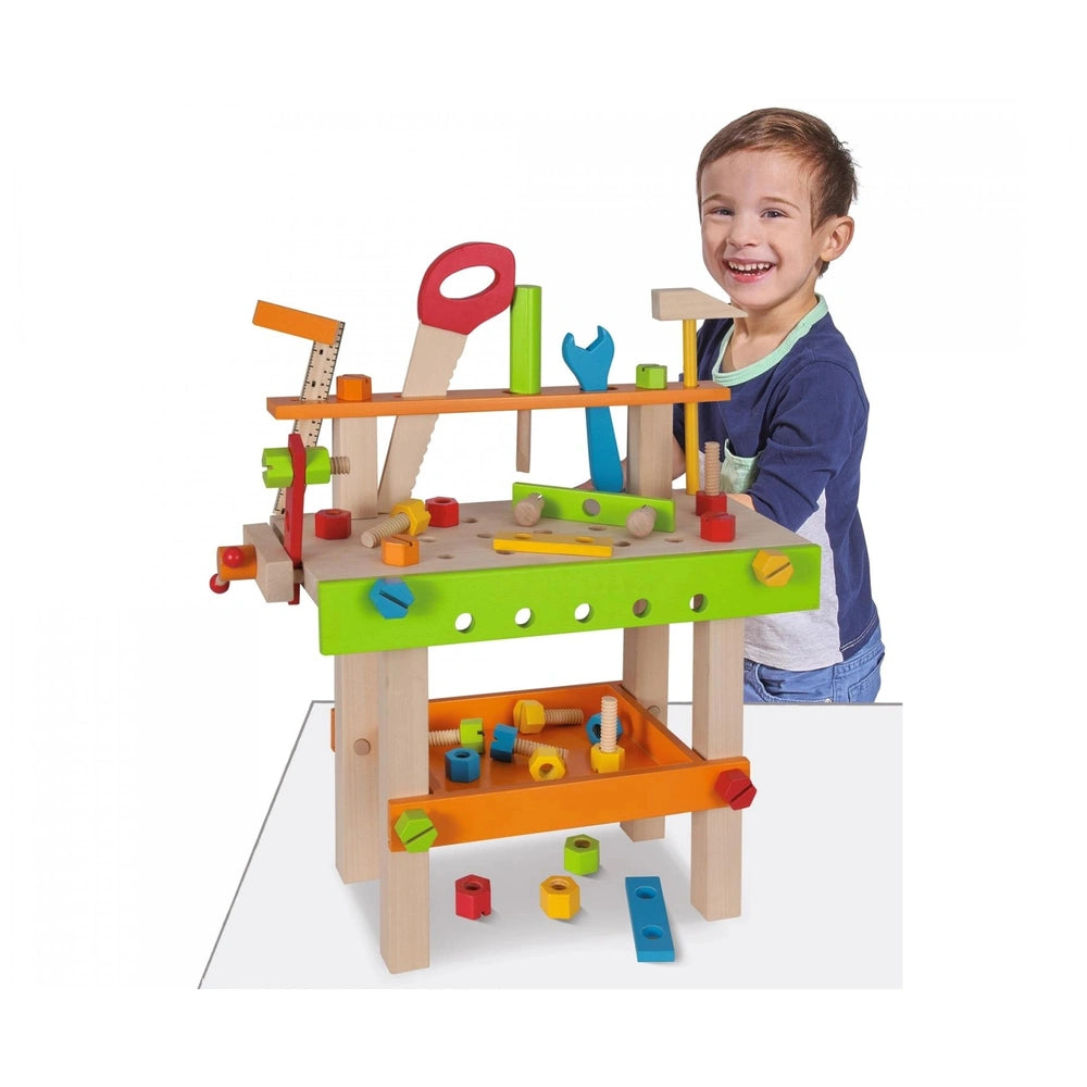 Eichhorn Work Bench toy features a smiling child in a blue shirt and apron engaged in creative building activities.
