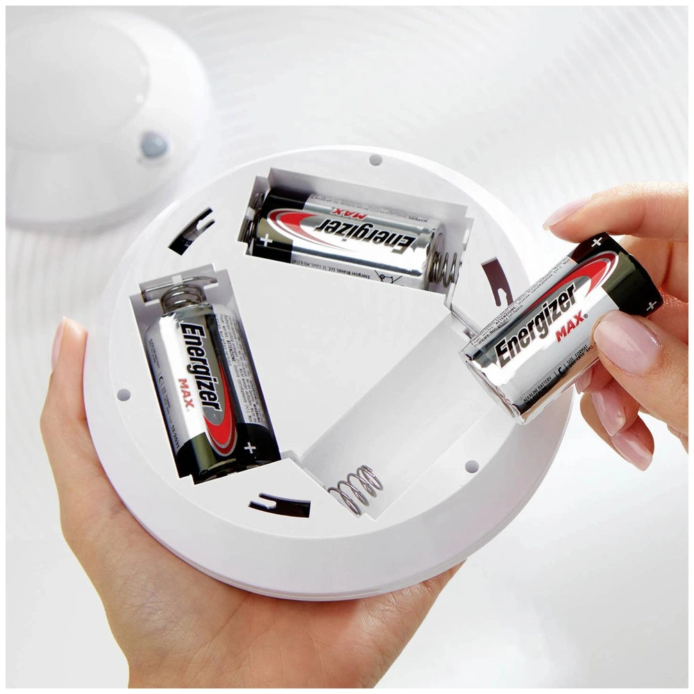 Energizer Max LR14 C batteries in a white plastic container with a clear lid, featuring black, red, and silver designs.