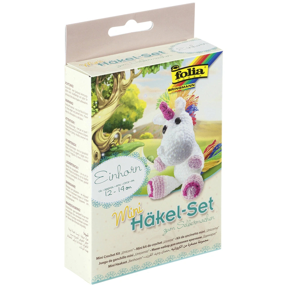 Folia Mini Crochet Kit featuring a pastel unicorn design in a matte cardboard package with a transparent window and German te