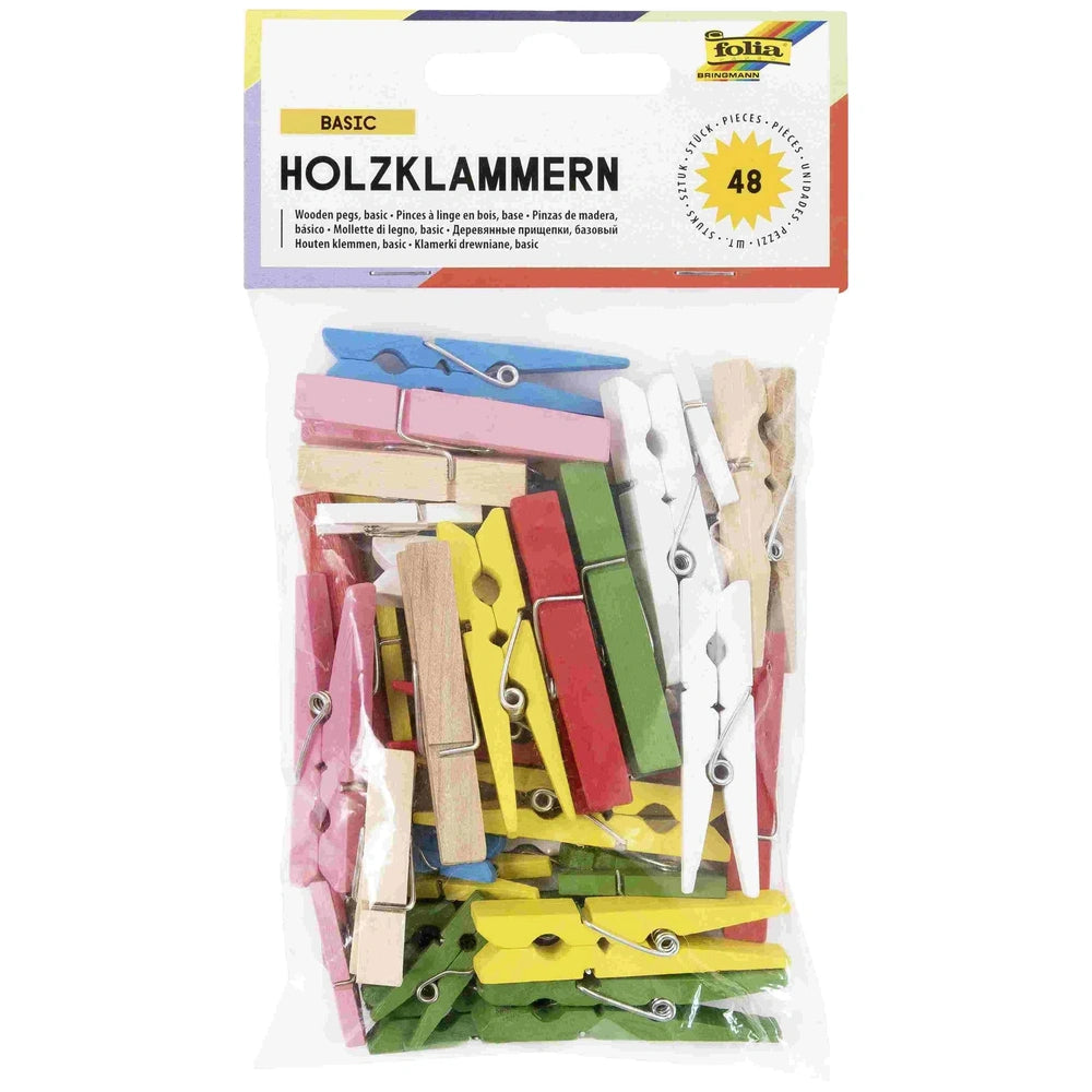 Wooden clips in various colors, packaged in glossy cardboard with a transparent window, labeled "BASIC HOLZKLAMMERN" and "48"