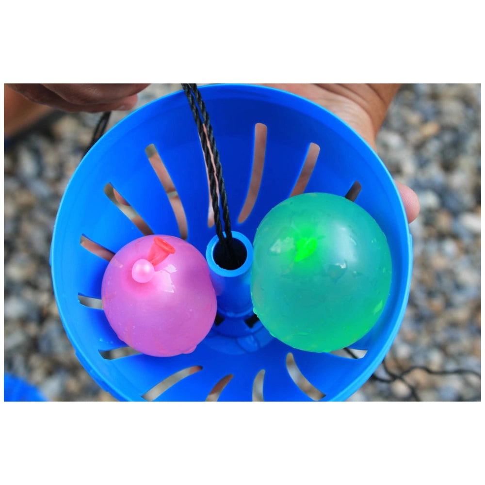 Goliath Wahu Zoom Ball Hydro Sports Toys featuring a blue container, pink and green balls, and a black string.