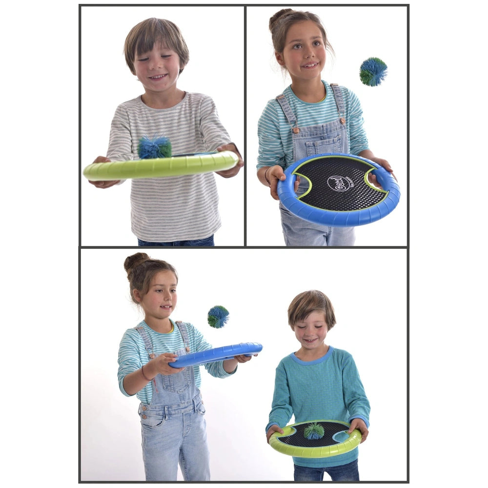 Gowi Active Hand Trampoline Game features two children in denim playing with a blue and green frisbee in motion.