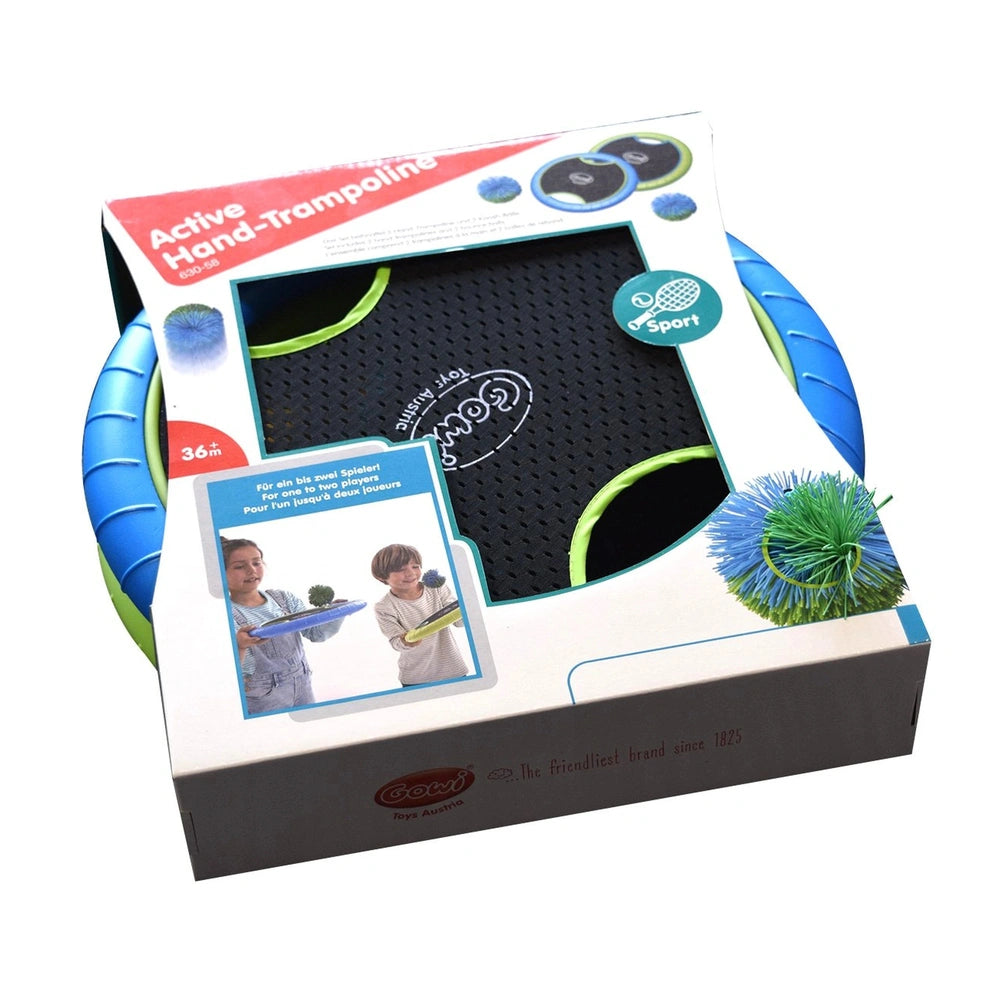 Gowi Active Hand Trampoline game packaging features a black trampoline mat with green border, visible through a plastic windo