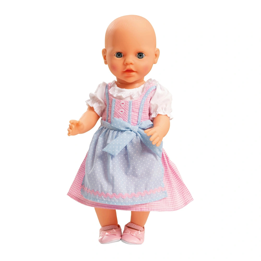Heless Dirndl doll features a bald head, blue eyes, pink lips, blue dress with pink checkered pattern, and pink shoes.
