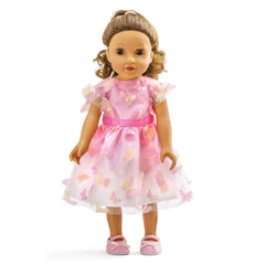 Heless Miss Butterfly doll features light beige skin, light brown glossy hair, and a pink dress with butterfly patterns.