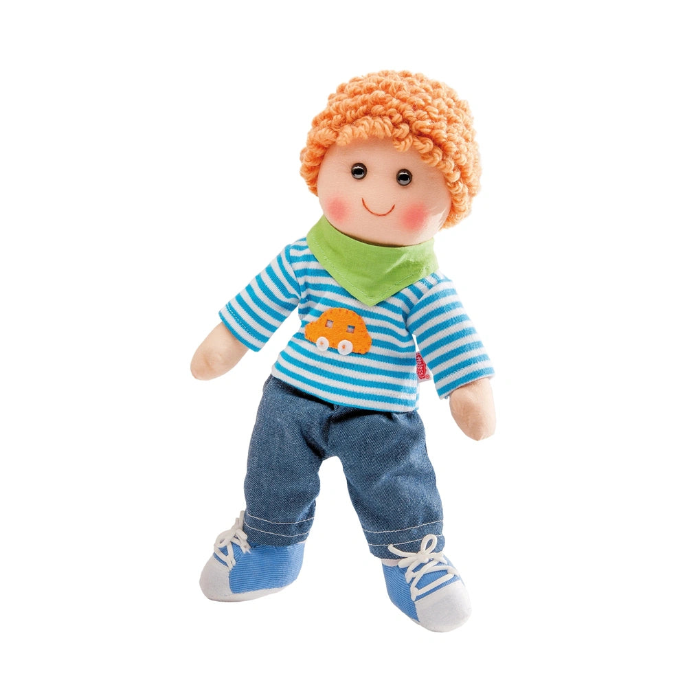 Heless Nici Soft Doll with orange yarn hair, blue and white striped shirt, blue pants, and a green scarf, smiling face.