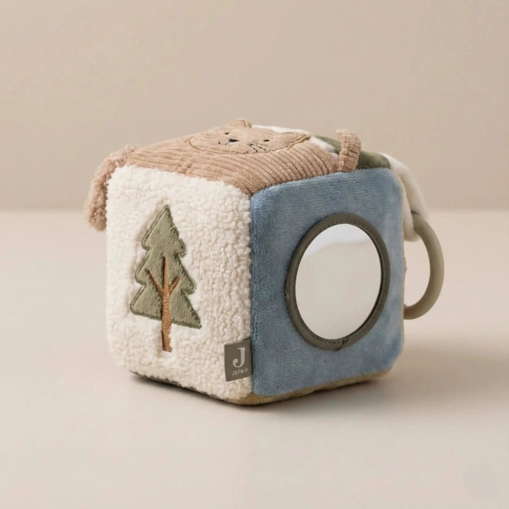 Jollein Activity Cube Tiny Park features a blue fabric exterior and white interior, designed for engaging baby playtime.