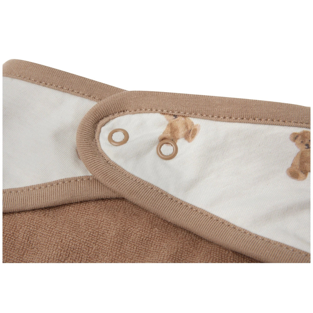 Jollein bib bandana teddy bear toys in muted brown and white matte textile, featuring two distinct fabric components.