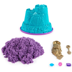 Kinetic Sand Mini Mermaid Lock set features purple and blue plastic items, including containers, a key, and a gem on a white 