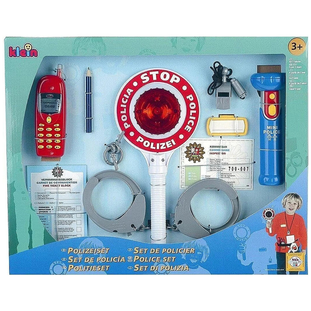 Klein Police Set 10 Pcs includes toy walkie-talkies, flashlights, phone, handcuff, and badges in glossy windowed packaging.