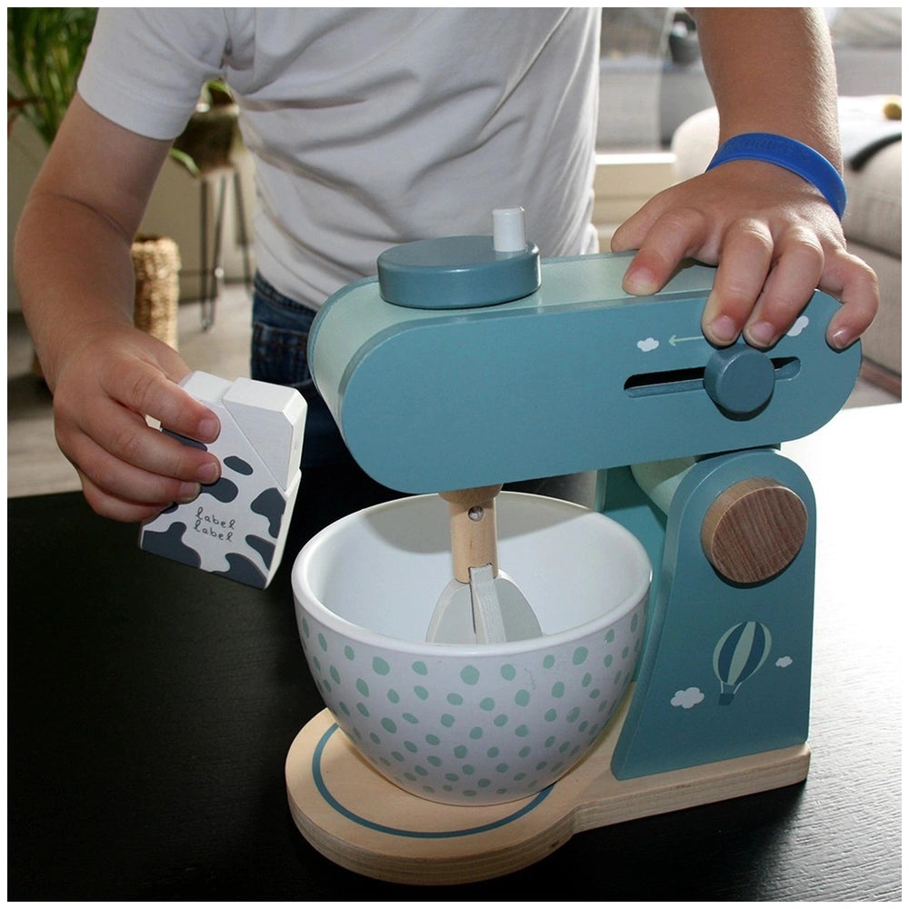 Label-Label Food Processor features a white bowl with green dots, blue mixer base and handle, and white plastic blade.
