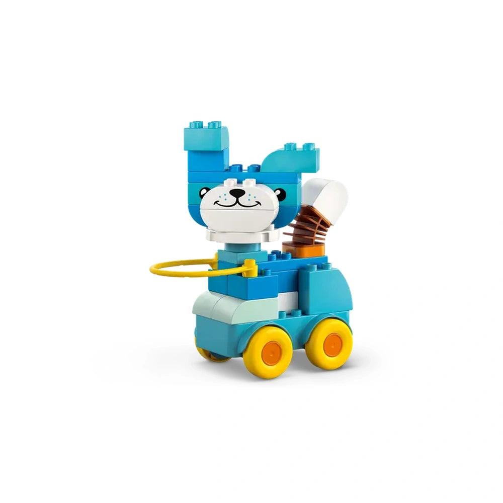 LEGO - 3in1 Animals on Wheels features a smiling blue toy with yellow wheels and a white head against a light background.