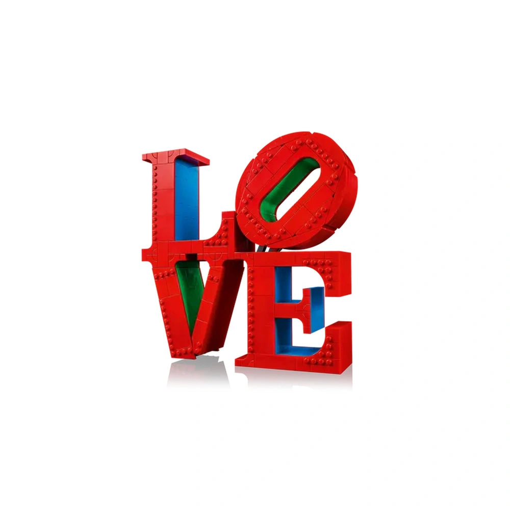 Lego construction set features the word "LOVE" in bold red letters, interlocked with vibrant blue and green bricks.