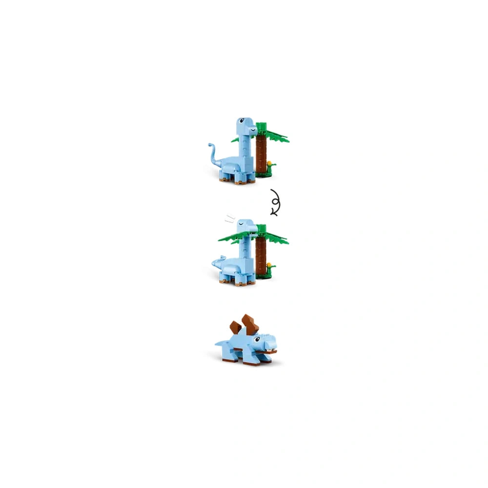 Blue dinosaur model next to a palm tree and brown tree trunk, showcasing playful, colorful LEGO® bricks with expressive features.