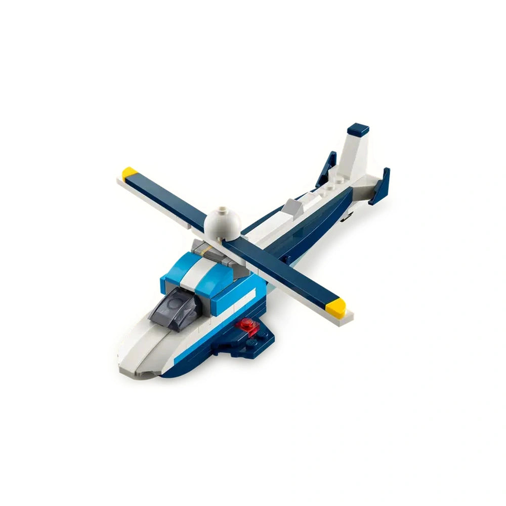 Blue and white LEGO® helicopter model with a spinning rotor blade, detailed cockpit, and moving parts, designed for creative play.