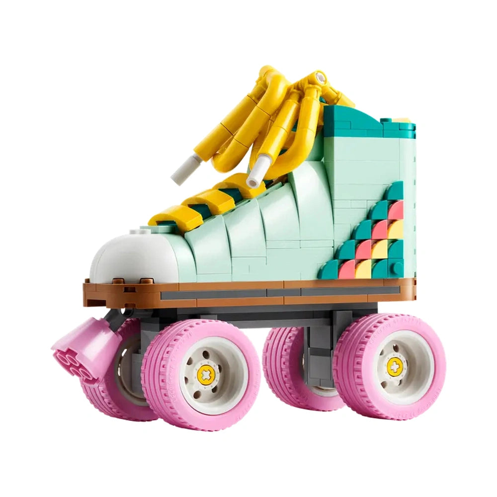 Retro LEGO Creator roller skate model in mint green, featuring four pink wheels, yellow laces, and colorful decor.