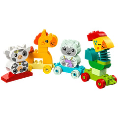 Four colorful LEGO® DUPLO® animal figures on detachable train carriages: a cow with a flower, a horse with an orange mane, a lamb in blue, and a parrot with a playful design.
