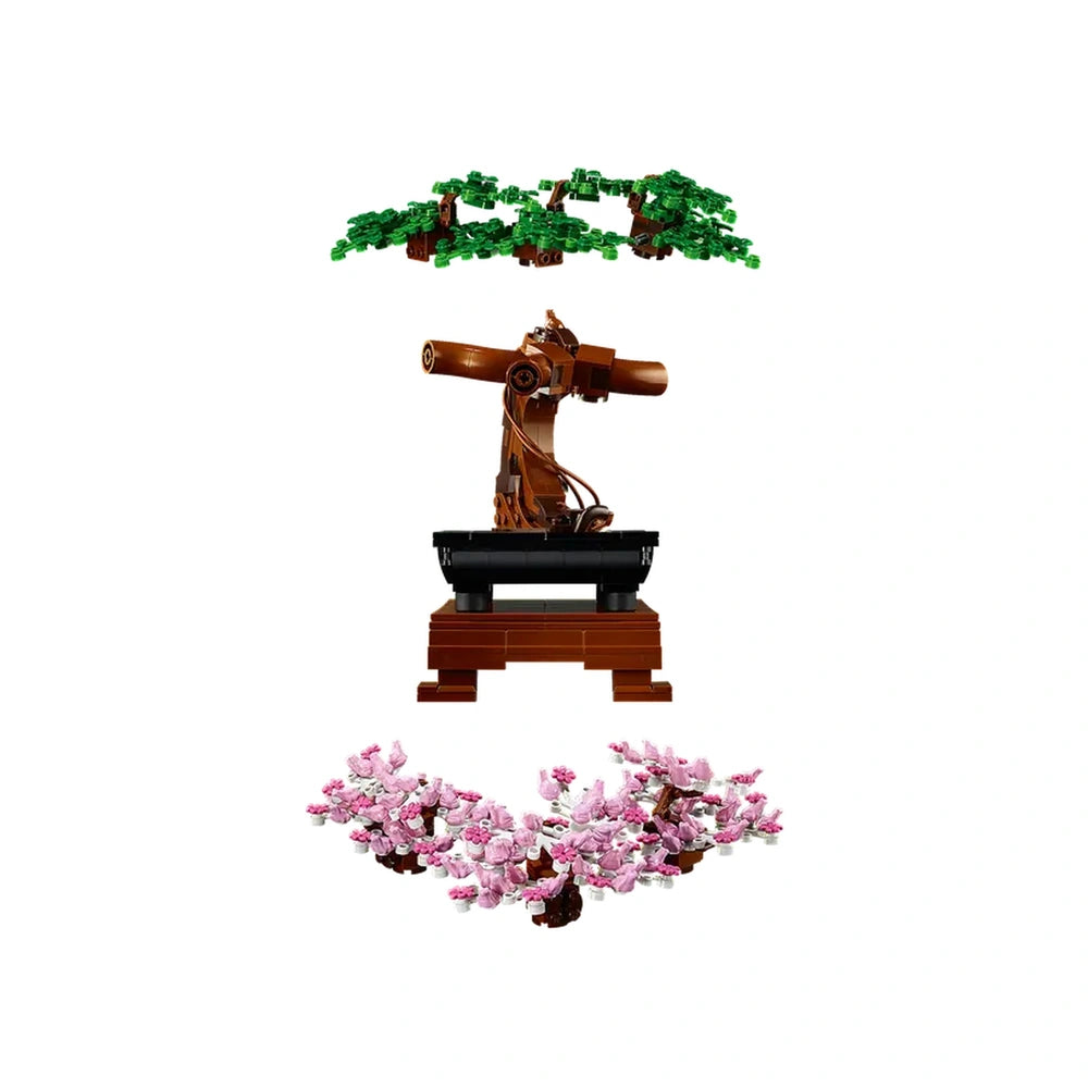 LEGO® Icons Bonsai Tree construction set featuring a brown tree trunk and branches, green leaves above, and pink cherry blossoms below, all on a sturdy black and brown base.