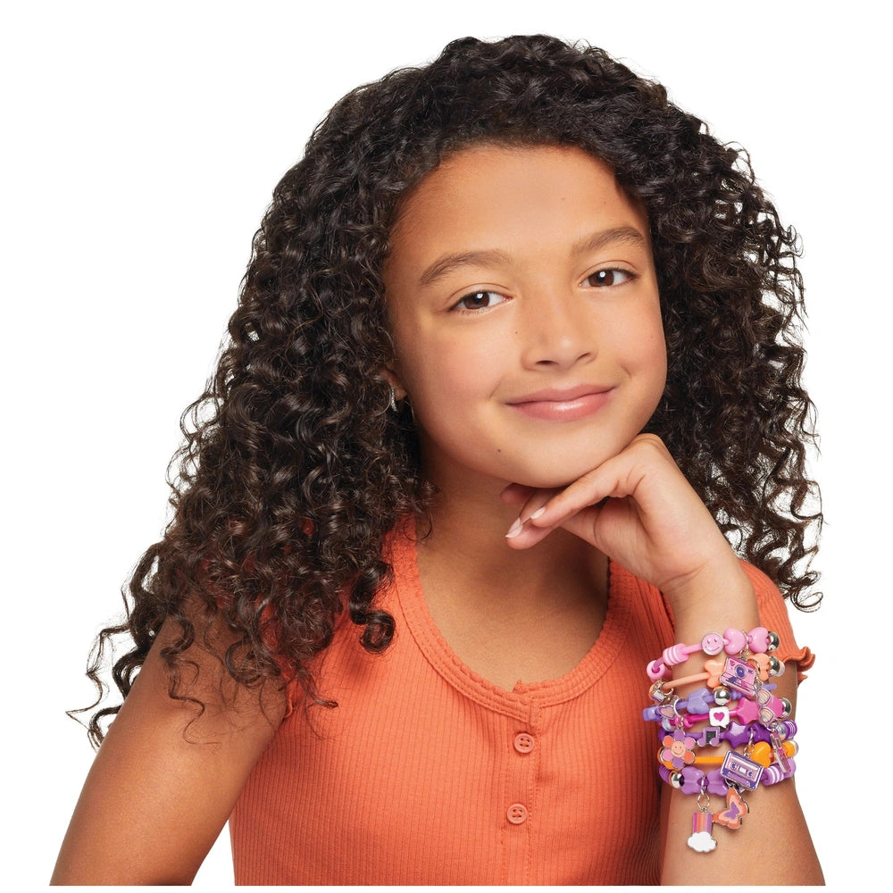 DIY Fashion Beaded Bangle Bracelets worn by a smiling girl in an orange top, showcasing creativity and style.
