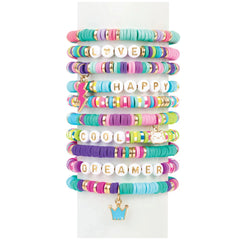 MAKE IT REAL Heishi Craze Swift Clicks set features multi-colored bracelets made of glossy plastic and matte fabric, showcasi