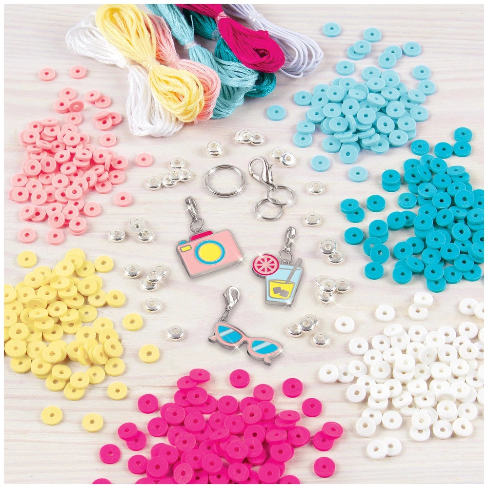 Summer Vibes Heishi Bead Set featuring colorful plastic beads and metal components, arranged in a close-up layout.