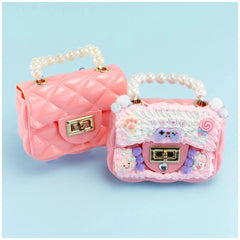 Momomi Decoden Kawaii Artist Creamy Bag in pink with white icing, pearls, gold buttons, and heart-shaped charms.