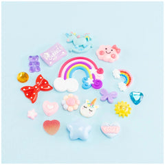 Momomi Decoden Kawaii Artist Creamy Phone Cover Starter Pack featuring colorful plastic, rubber, and metal embellishments.