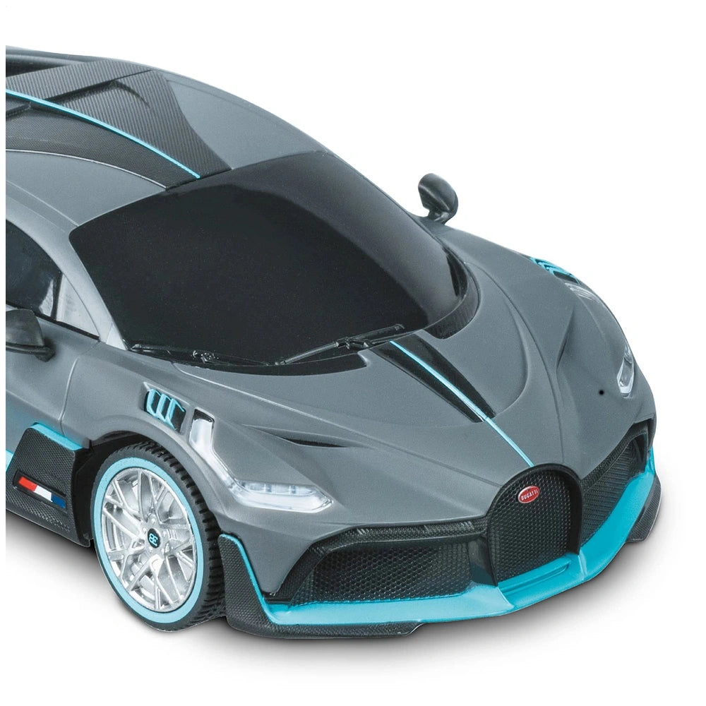 Mondo Bugatti DIVO radio-controlled car in light gray with black roof, silver wheels, and glossy finish, showcasing sleek des