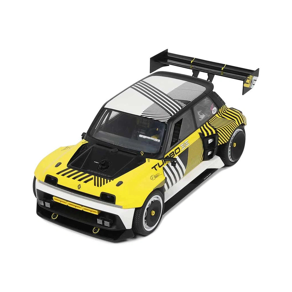 RC Renault 5 Turbo 3E in yellow with a black roof, featuring yellow and white stripes, black accents, and tinted windows.