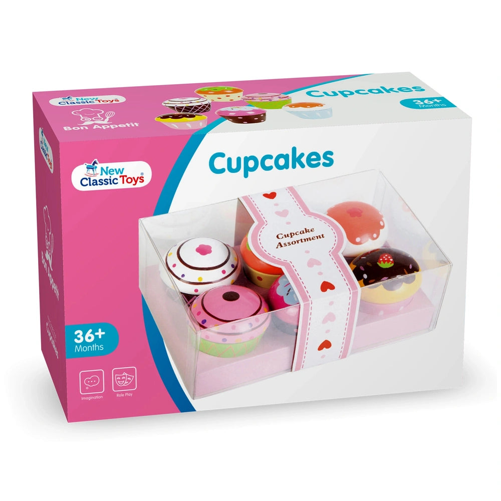 Toys Cupcake Assortment in a pink gift box with a clear window showcasing colorful decorated cupcakes and age label.
