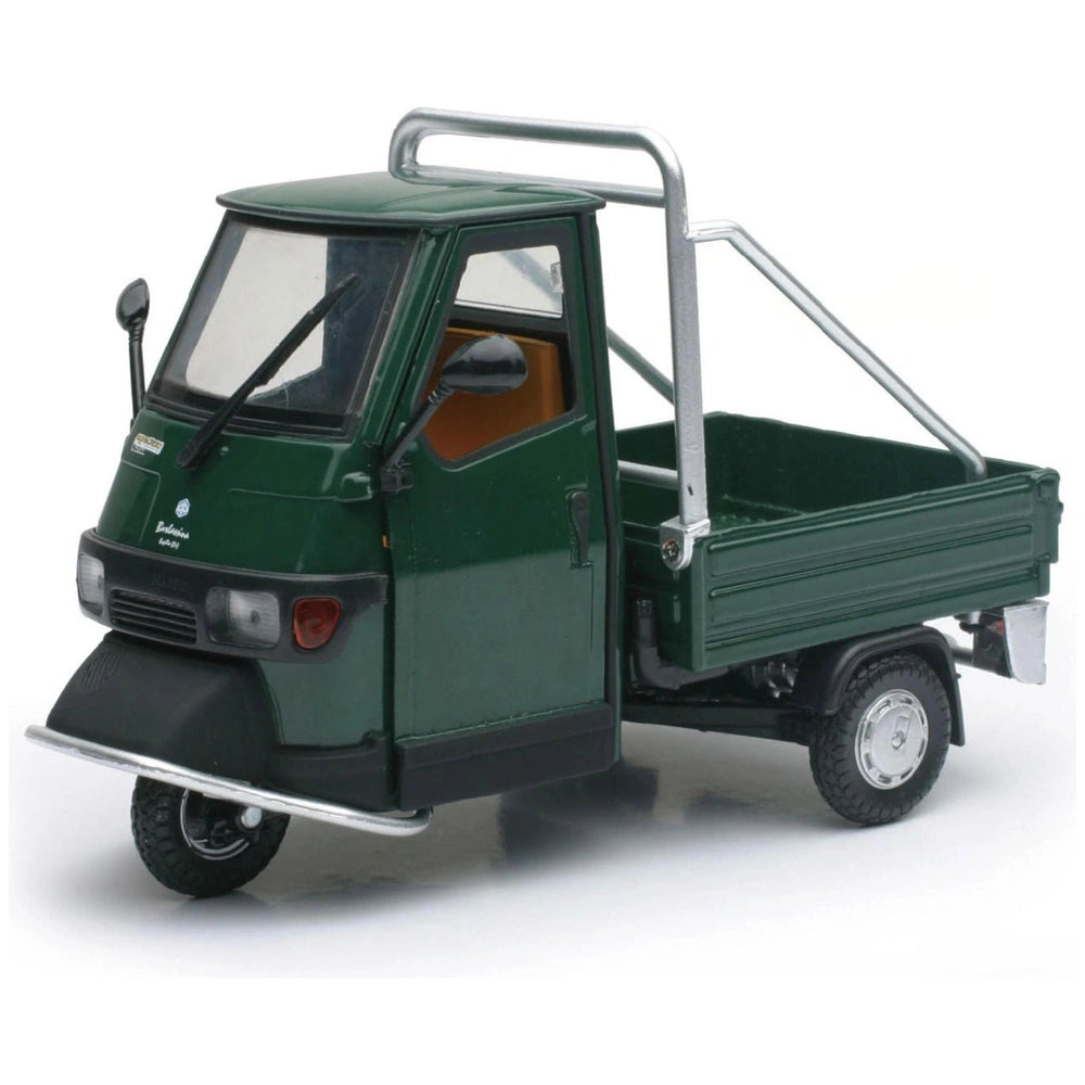 Piaggio Ape 50 Cross Country die-cast model in green with clear windows, black accents, and metal roof rack, front view.