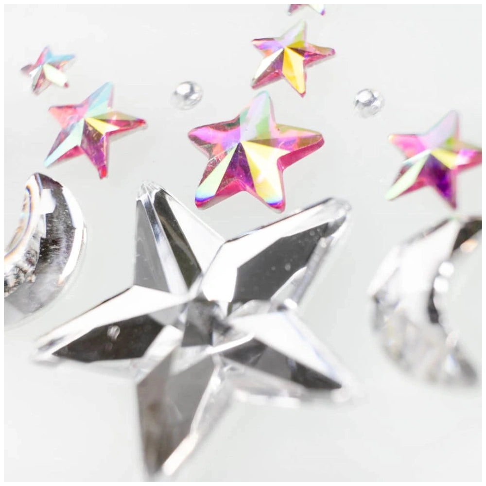 Star face gems pack featuring clear shiny and silver metal star shapes arranged centrally in a close-up view.