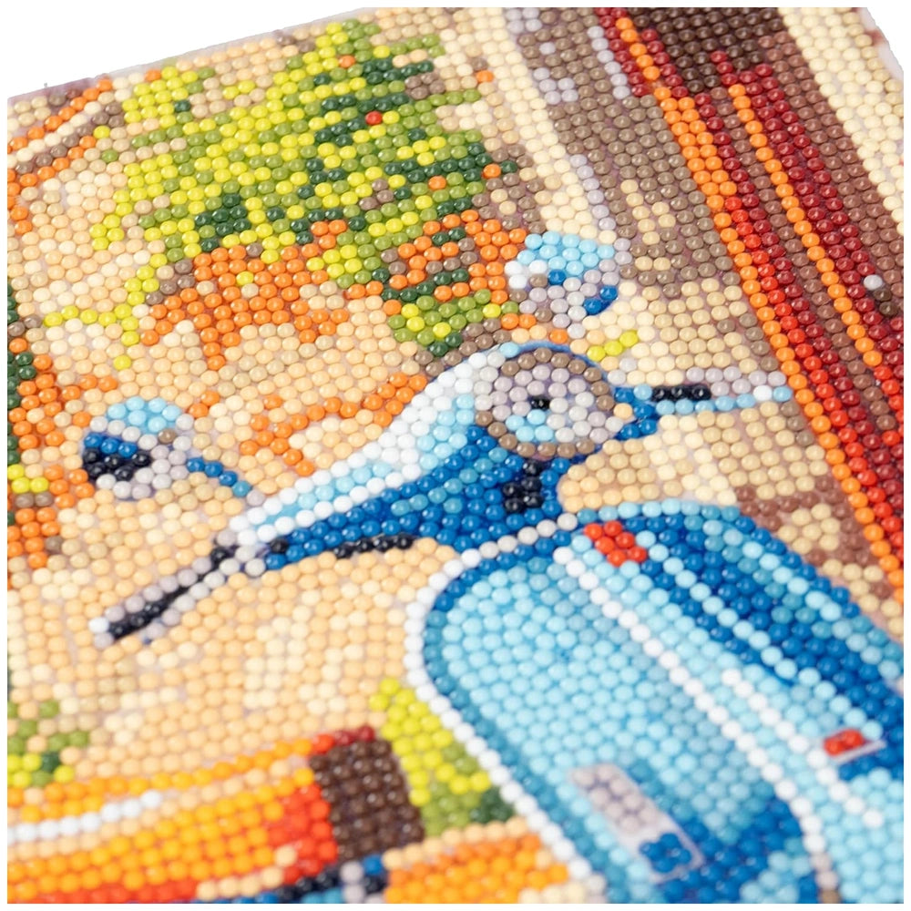 Diamantiny Artist Level Up painting on canvas features a glossy beaded surface with a stylized blue motorcycle and colorful a