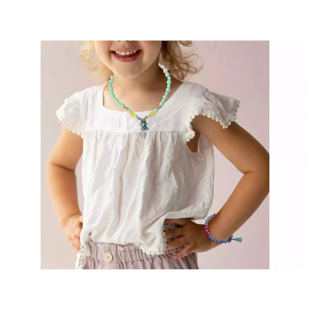 Jewel Design 600 Precious Beads displayed with a young girl in a white top, showcasing blue and yellow necklace and bracelet.