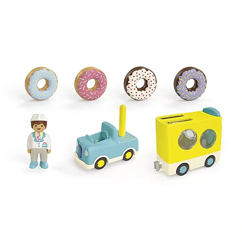 Playmobil Crazy-Donut-Truck features a yellow plastic body with black wheels, white roof, and blue front grill.