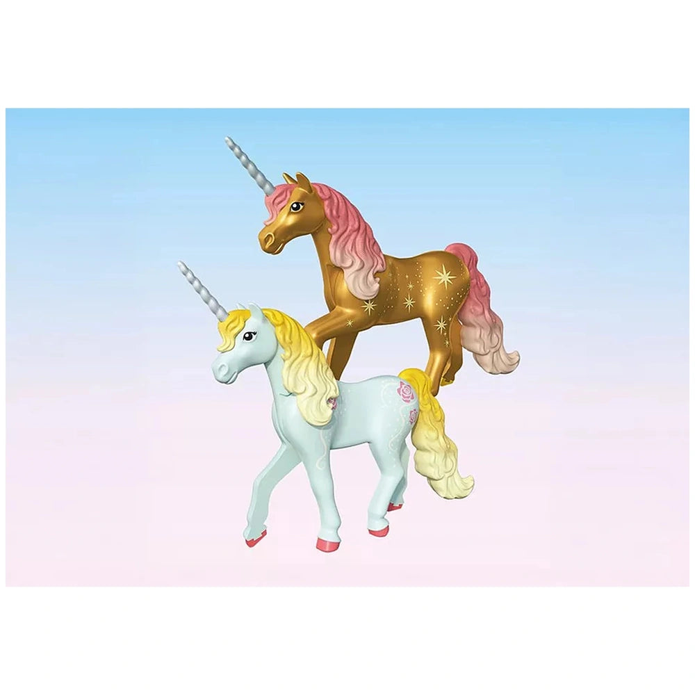Playmobil Magic Unicorns toy playset featuring two glossy unicorns with yellow and pink manes.