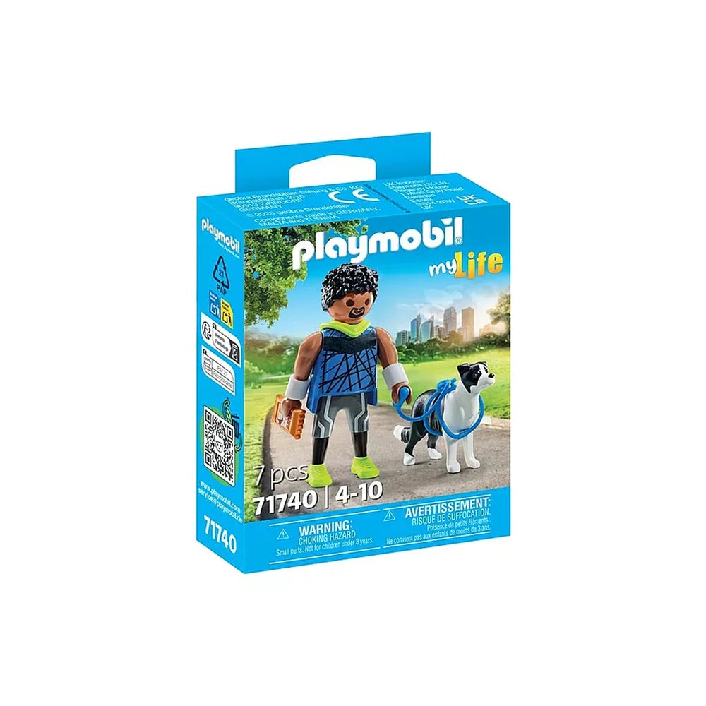 Playmobil MY LIFE Jogger toy playset in blue box with black and white dog, orange building, and yellow sky.