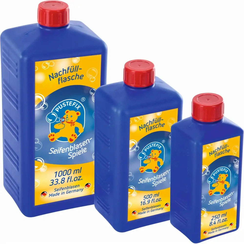 PUSTEFIX Professional Soap Bubble Liquid Refill 250ml bottles in blue with yellow labels, red caps, and German text.